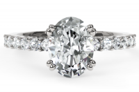 Four Claw Diamond Engagement Ring With Shared Claw Diamonds on Shoulders